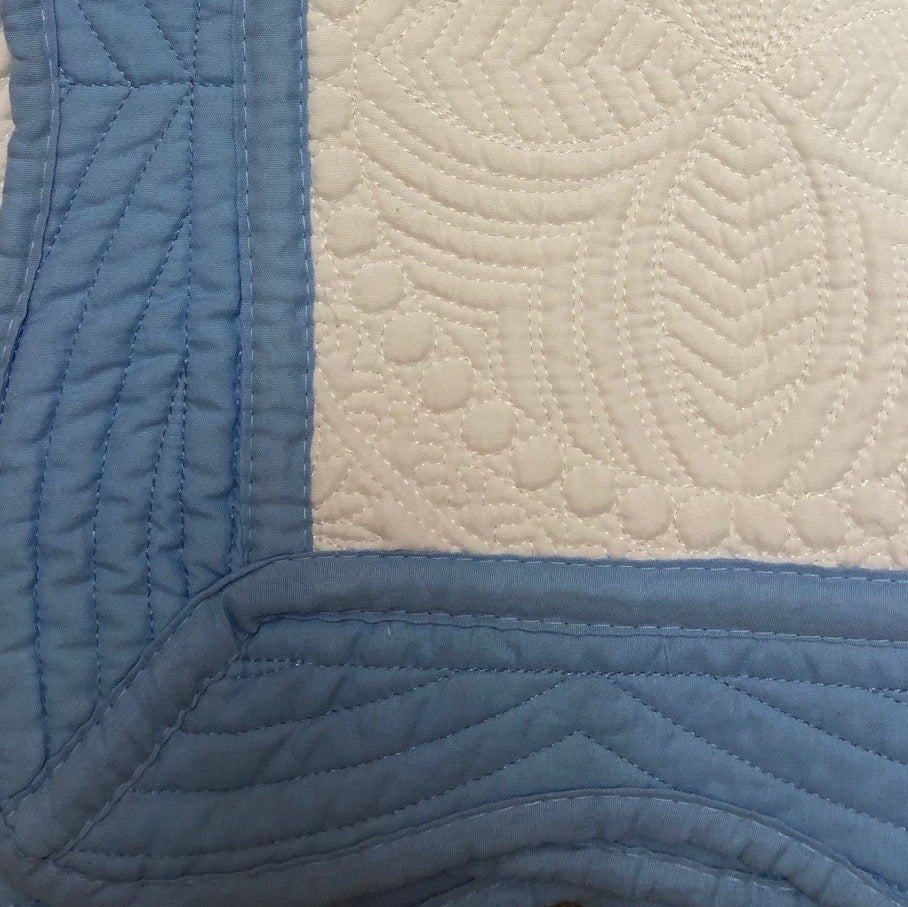 White quilted baby online blanket